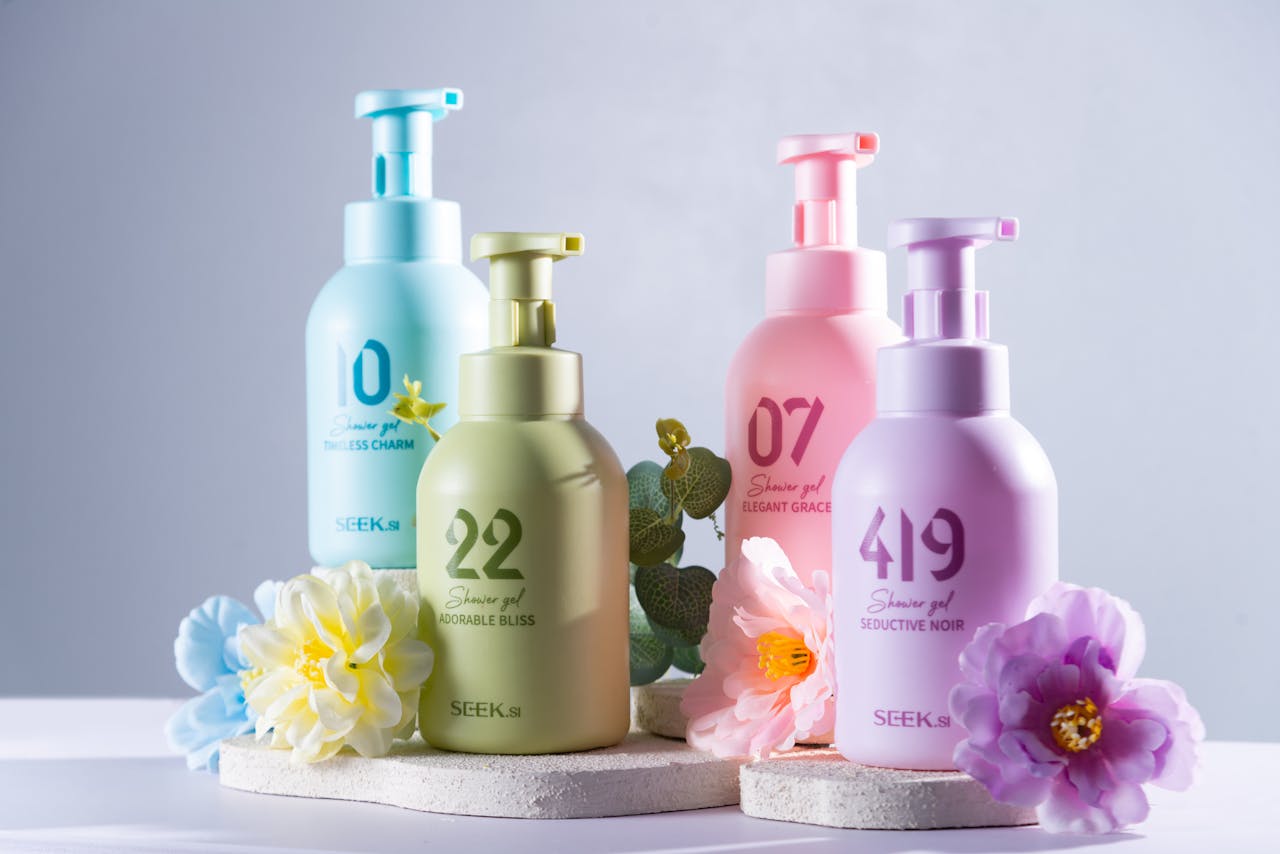 services-02 A vibrant display of shower gel bottles and flowers for an appealing product shot.